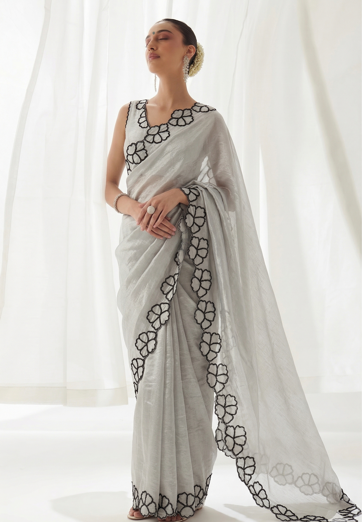 Midnight Bloom Pure Crepe Silk Saree With Handcrafted Cutdana Border