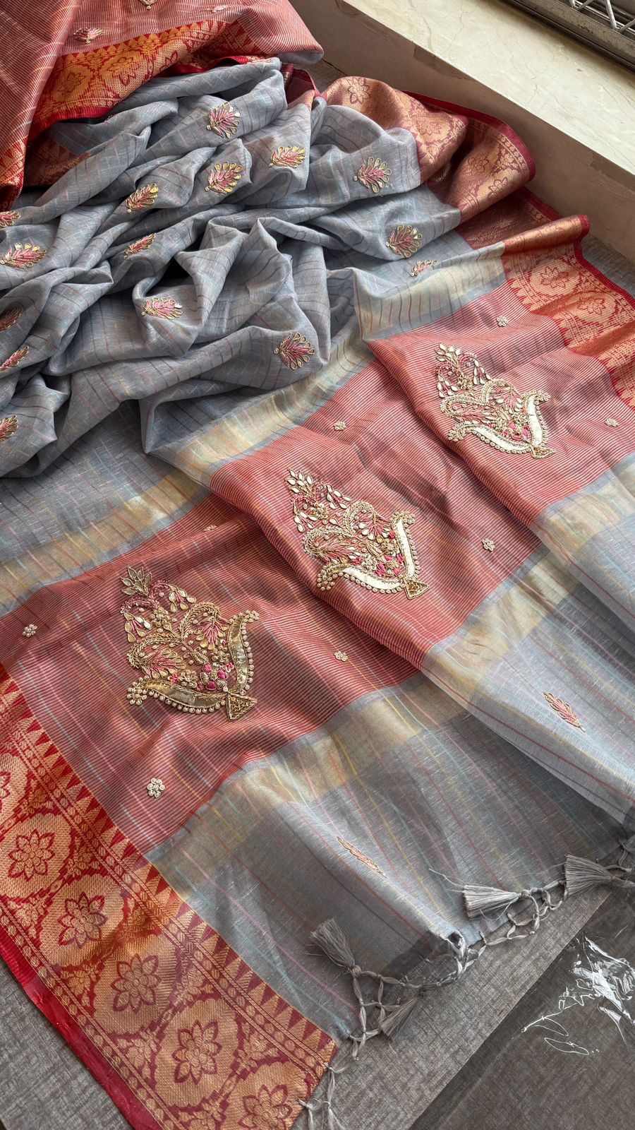 Regal Tissue Linen Silk Saree With Handcrafted Zardozi Kalash Motif & Banarasi Border