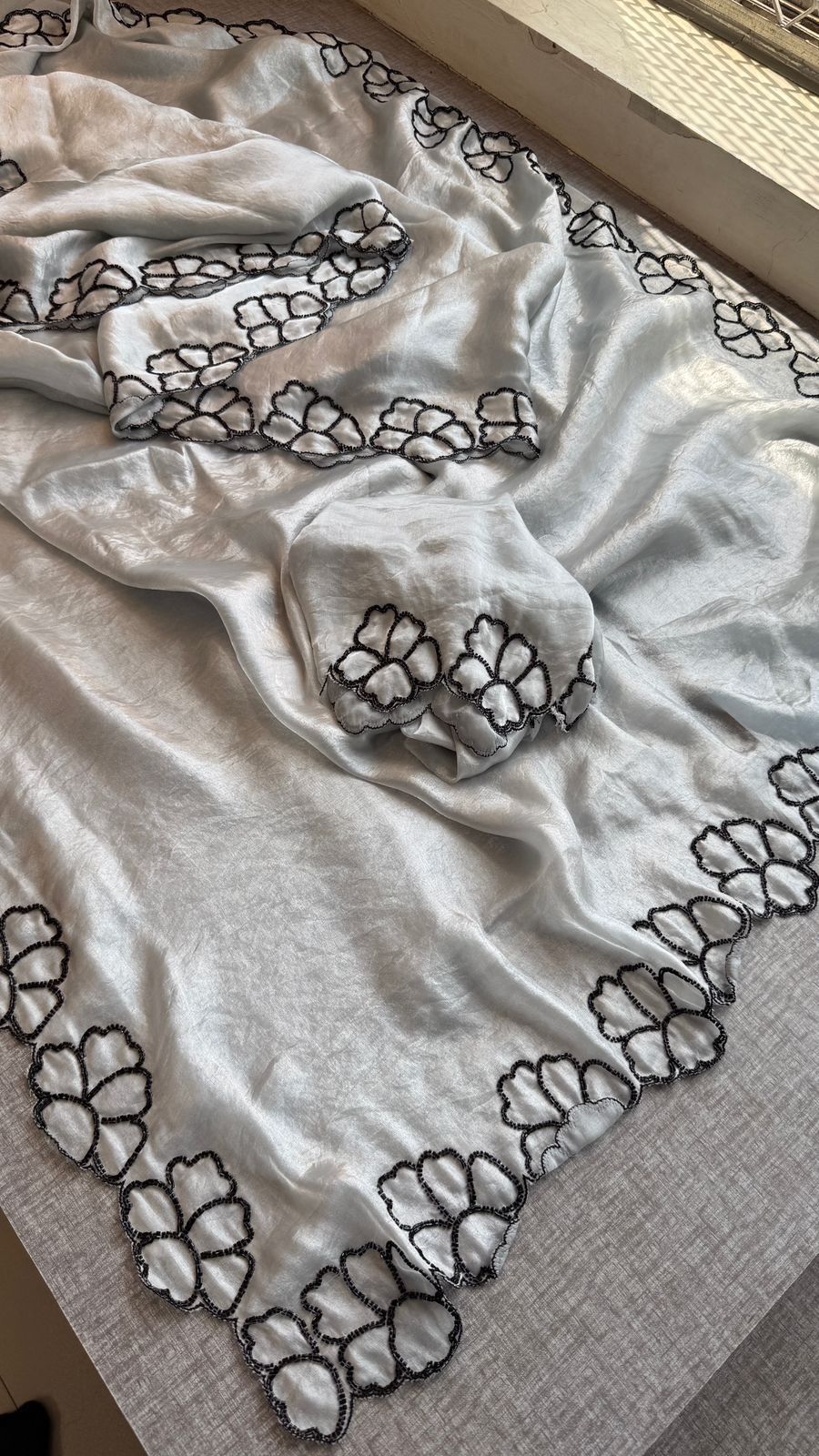 Midnight Bloom Pure Crepe Silk Saree With Handcrafted Cutdana Border