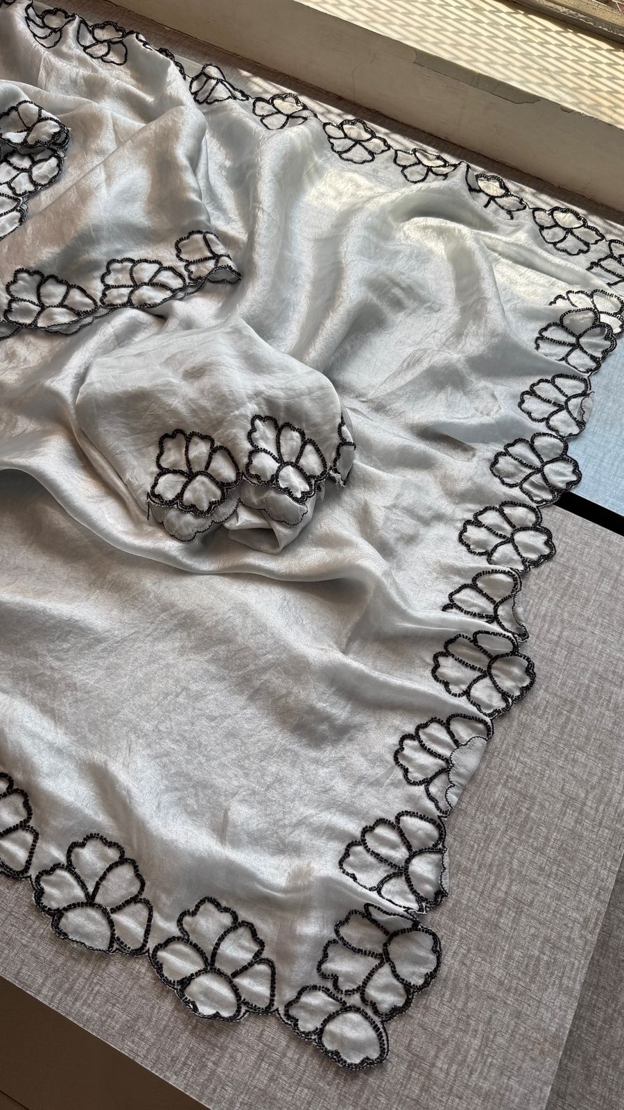 Midnight Bloom Pure Crepe Silk Saree With Handcrafted Cutdana Border