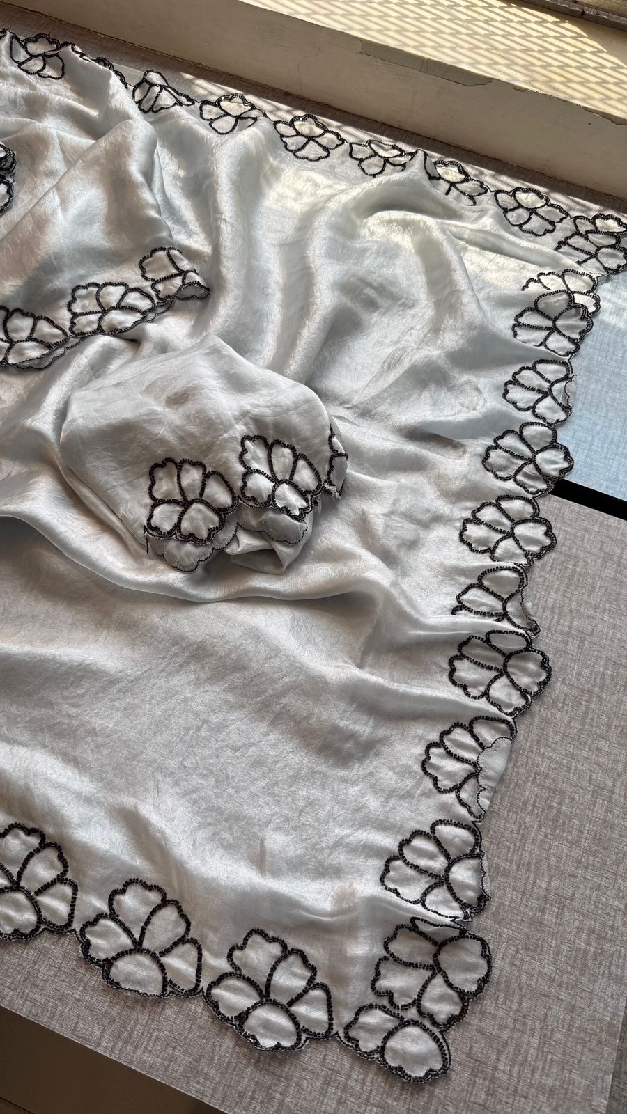 Midnight Bloom Pure Crepe Silk Saree With Handcrafted Cutdana Border