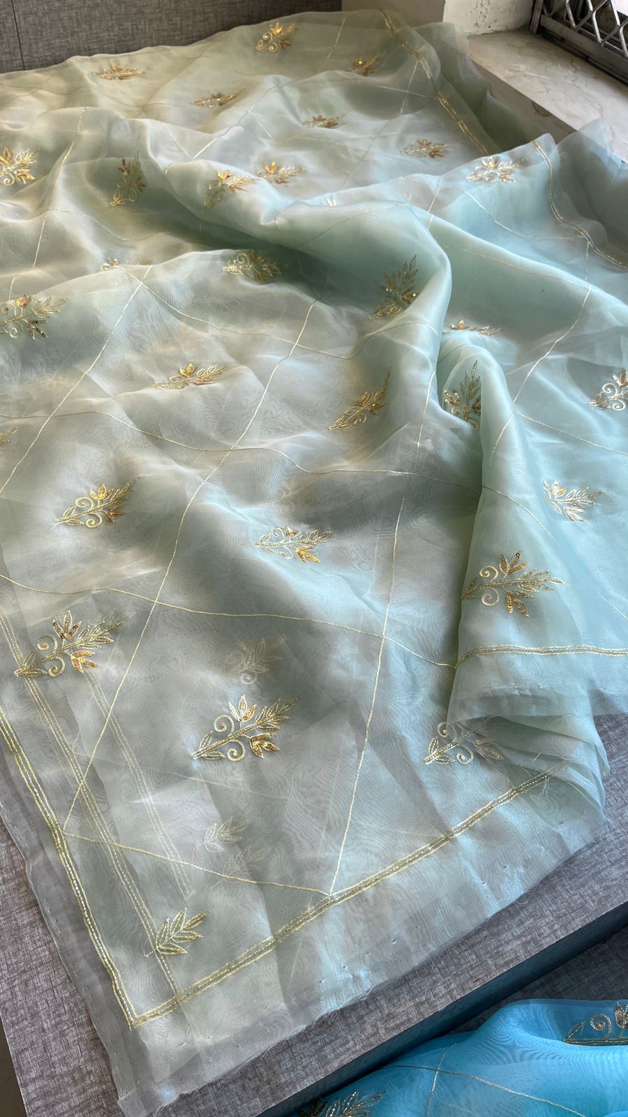 Premium Tissue Organza Saree With Gold Embroidered Butti And Elegant Grid Pattern