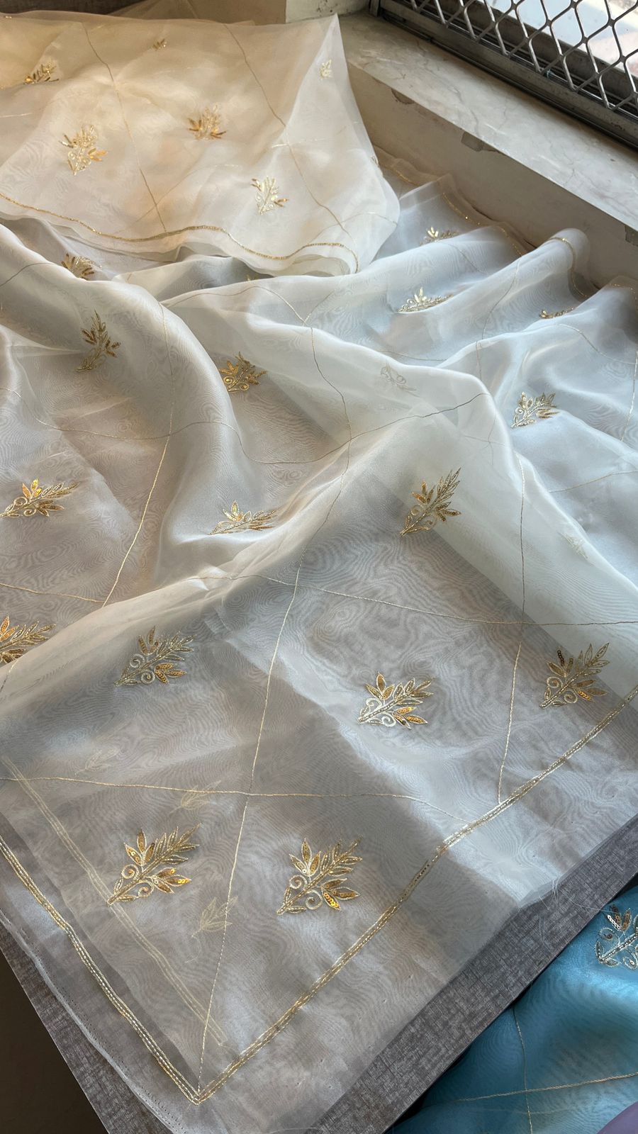 Gold Zari Butti On Tissue Organza Silk · 28 Artisan Hours of work · The Sunehri Edit